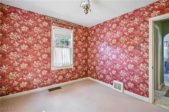 474 W 4th St, Salem, OH 44460 - carpeted empty room featuring baseboards
