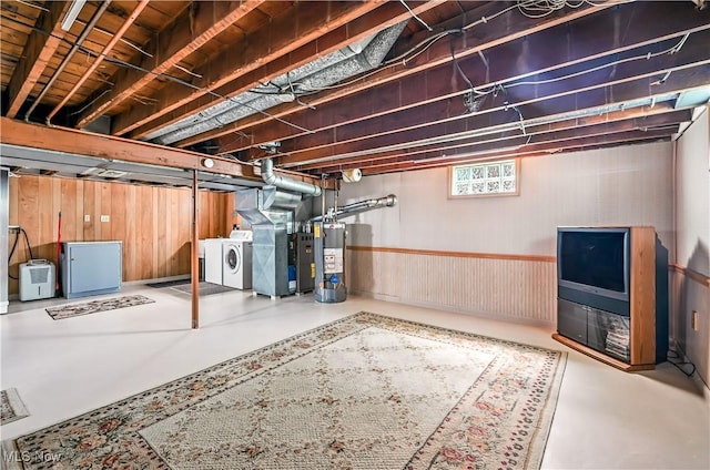 474 W 4th St, Salem, OH 44460 - below grade area featuring washer and clothes dryer, water heater, refrigerator, and heating unit