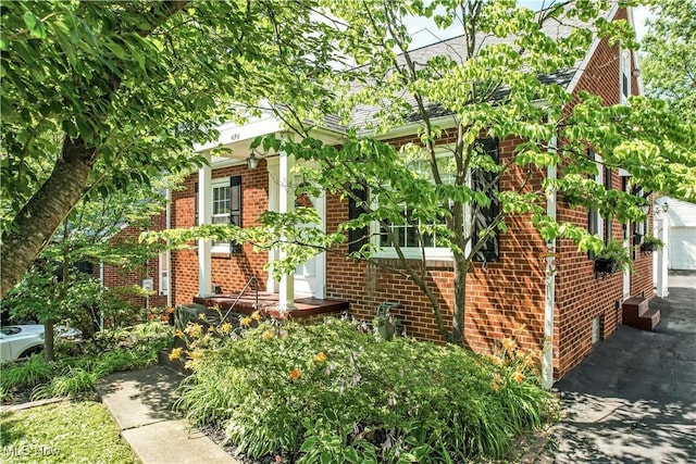 474 W 4th St, Salem, OH 44460 - view of front of property featuring brick siding and a shingled roof