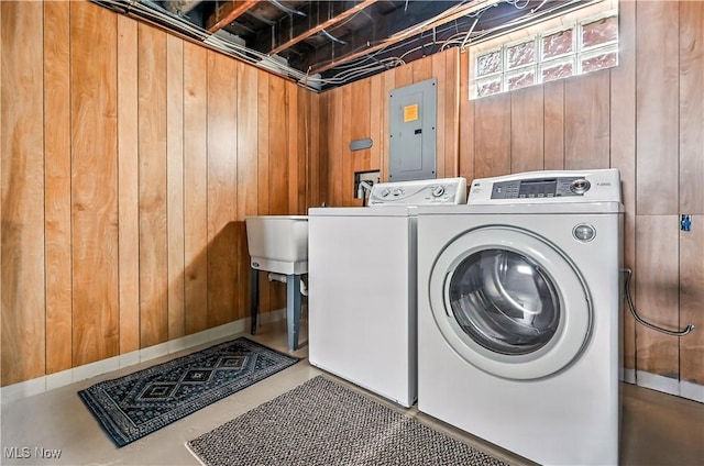 474 W 4th St, Salem, OH 44460 - washroom featuring electric panel, wood walls, and separate washer and dryer