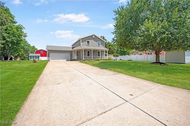 12366 Springwater Ave NW, Uniontown, OH 44685 - traditional-style house with covered porch, concrete driveway, and an attached garage
