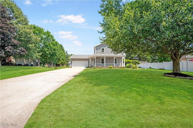 12366 Springwater Ave NW, Uniontown, OH 44685 - view of front facade with covered porch, a garage, and concrete driveway