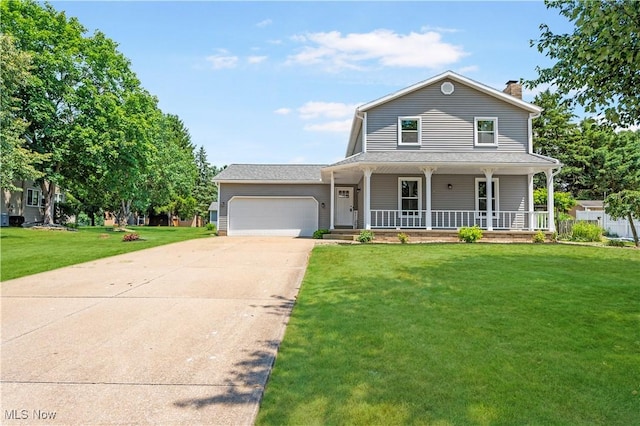 12366 Springwater Ave NW, Uniontown, OH 44685 - view of front of property with a garage, driveway, a front lawn, a porch, and a chimney