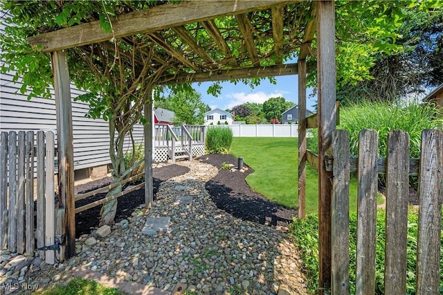 12366 Springwater Ave NW, Uniontown, OH 44685 - fenced backyard featuring a wooden deck