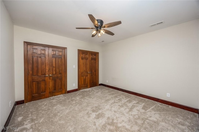 1096 Colegate Dr, Marietta, OH 45750 - unfurnished bedroom featuring carpet flooring and a ceiling fan