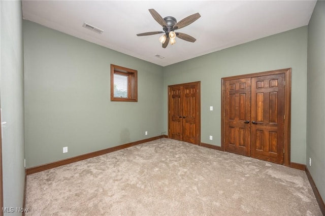 1096 Colegate Dr, Marietta, OH 45750 - unfurnished bedroom with carpet floors and ceiling fan