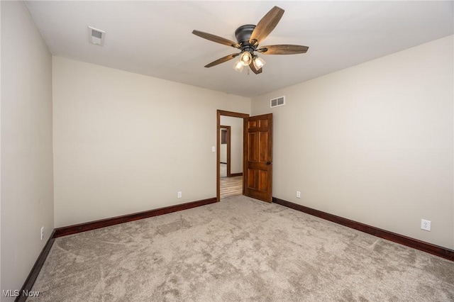 1096 Colegate Dr, Marietta, OH 45750 - spare room with ceiling fan and light colored carpet
