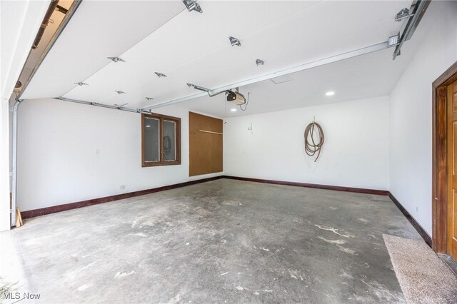 1096 Colegate Dr, Marietta, OH 45750 - garage with a garage door opener and baseboards