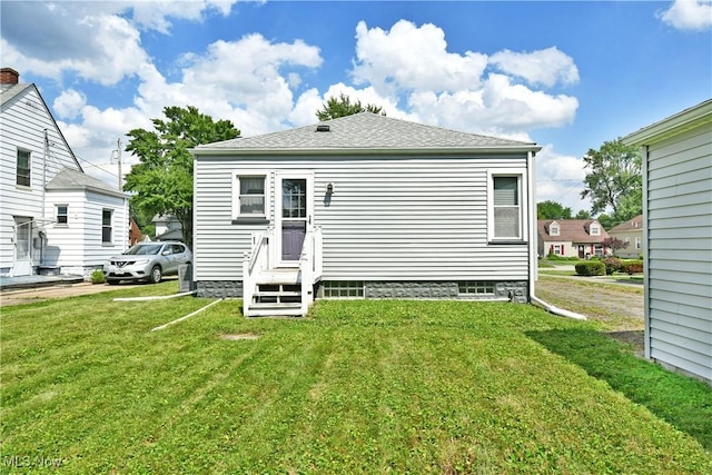364 Meadowbrook Ave SE, Warren, OH 44483 - rear view of house featuring a yard and entry steps