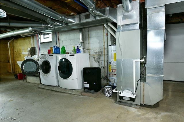 364 Meadowbrook Ave SE, Warren, OH 44483 - basement with separate washer and dryer, heating unit, and gas water heater