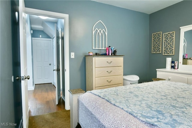 364 Meadowbrook Ave SE, Warren, OH 44483 - carpeted bedroom with wood finished floors