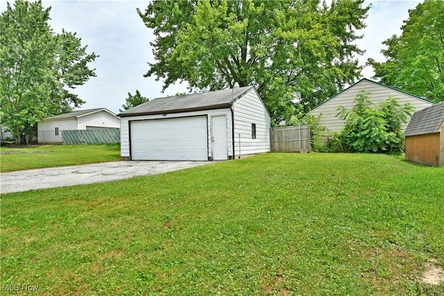 33 Mcdonald Ave, Niles, OH 44446 - view of yard featuring an outbuilding and a garage