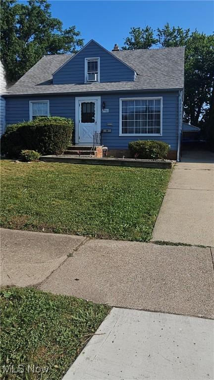 25801 Zeman Ave, Euclid, OH 44132 - bungalow-style home with a front lawn and roof with shingles