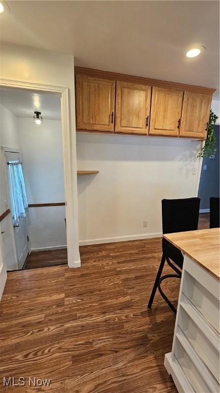 25801 Zeman Ave, Euclid, OH 44132 - kitchen featuring dark wood-type flooring, recessed lighting, and brown cabinets