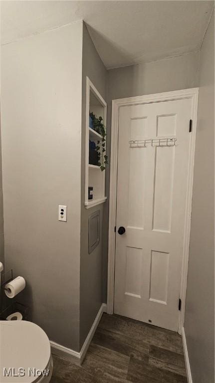 25801 Zeman Ave, Euclid, OH 44132 - bathroom featuring wood finished floors and baseboards
