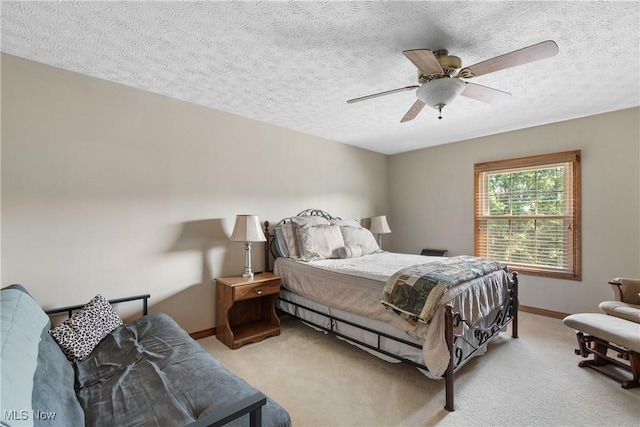 2785 Chalford Cir NW, North Canton, OH 44720 - bedroom with light colored carpet, a textured ceiling, and a ceiling fan