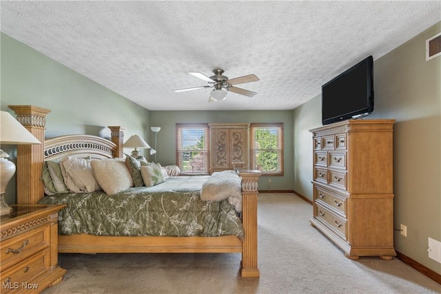 2785 Chalford Cir NW, North Canton, OH 44720 - bedroom featuring light colored carpet, ceiling fan, and a textured ceiling