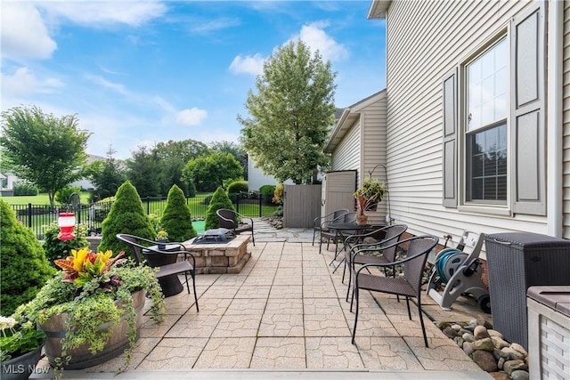 2785 Chalford Cir NW, North Canton, OH 44720 - view of patio / terrace featuring a fire pit