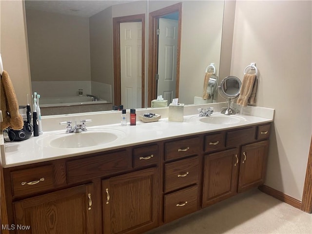 2785 Chalford Cir NW, North Canton, OH 44720 - bathroom featuring double vanity and a garden tub