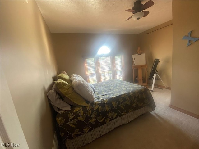 2785 Chalford Cir NW, North Canton, OH 44720 - bedroom with carpet, a textured ceiling, and a ceiling fan