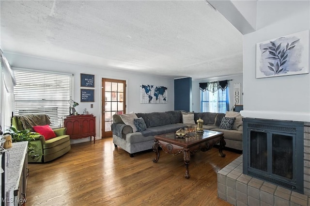 4221 2nd St NW, Canton, OH 44708 - living area with a textured ceiling and wood finished floors