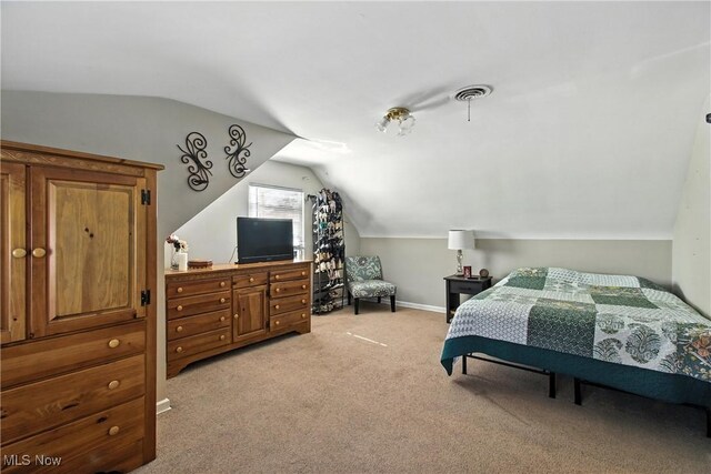 4221 2nd St NW, Canton, OH 44708 - bedroom with lofted ceiling and light carpet