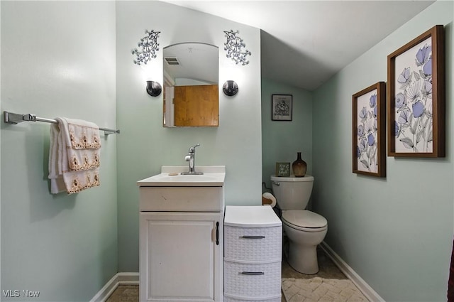 4221 2nd St NW, Canton, OH 44708 - bathroom featuring toilet and vanity