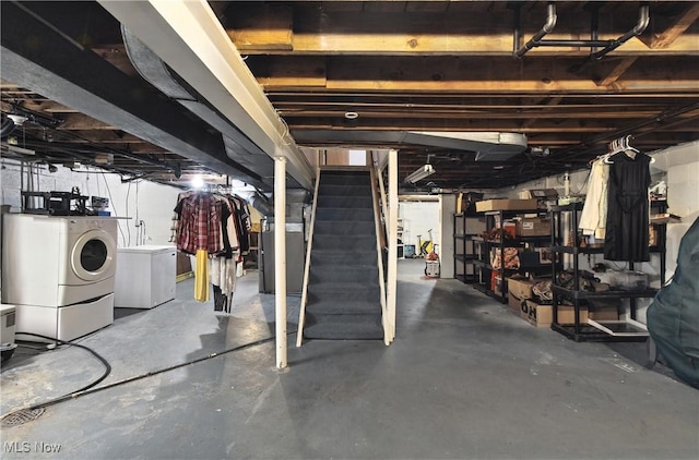 4221 2nd St NW, Canton, OH 44708 - unfinished below grade area with washing machine and dryer, stairway, and heating unit