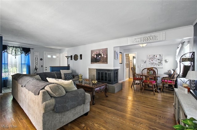 4221 2nd St NW, Canton, OH 44708 - living area featuring dark wood-type flooring and a fireplace