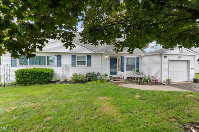 4221 2nd St NW, Canton, OH 44708 - ranch-style home featuring a garage, a front yard, entry steps, and driveway