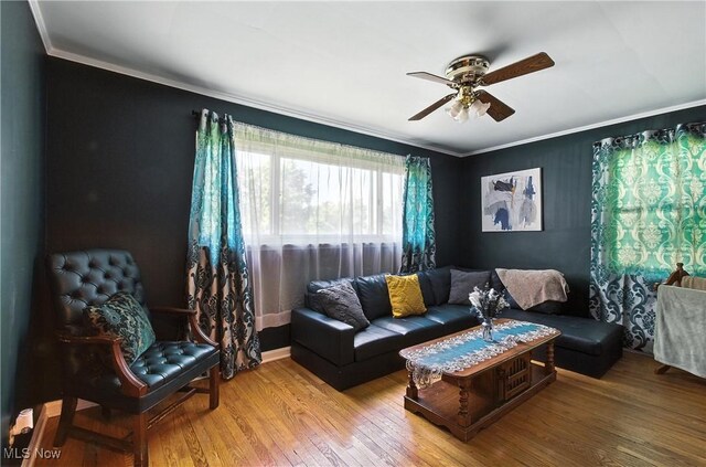 4221 2nd St NW, Canton, OH 44708 - living area featuring crown molding, ceiling fan, and wood finished floors
