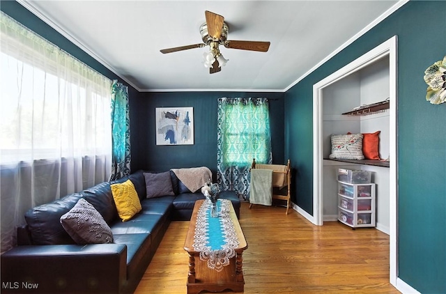 4221 2nd St NW, Canton, OH 44708 - living area featuring crown molding, ceiling fan, and wood finished floors