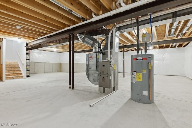 2014 Sugar Maple Dr, Kent, OH 44240 - unfinished basement featuring water heater, stairway, and heating unit