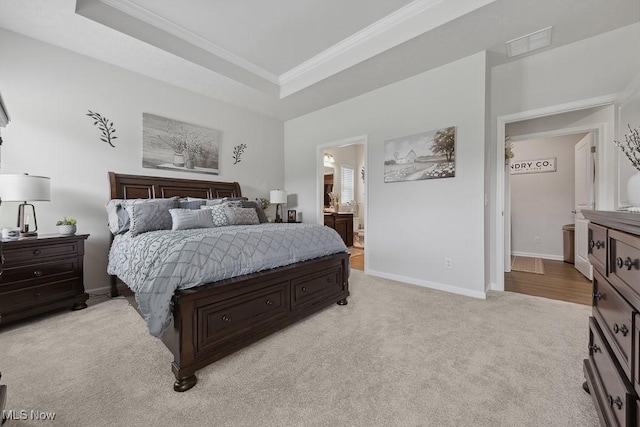 2014 Sugar Maple Dr, Kent, OH 44240 - bedroom with crown molding, light colored carpet, a tray ceiling, and ensuite bath