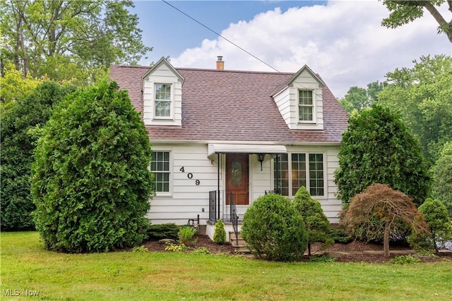 409 Yager Rd, New Franklin, OH 44216 - cape cod-style house with a front lawn and a shingled roof