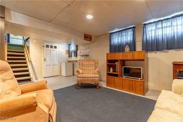 409 Yager Rd, New Franklin, OH 44216 - living area featuring stairway and washer and clothes dryer