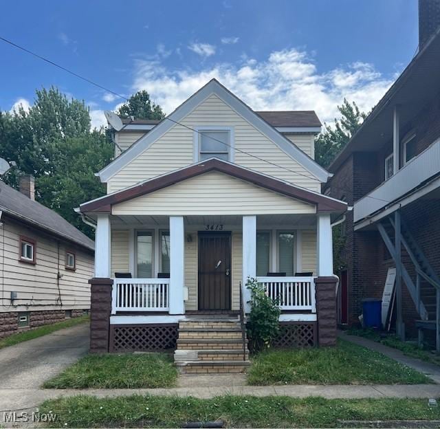3413 E 72nd St, Cleveland, OH 44127 - bungalow-style house featuring covered porch