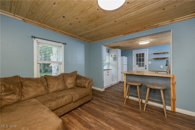 188 Stratford Ave, Wadsworth, OH 44281 - living room with wood ceiling, dark wood-style flooring, and ornamental molding