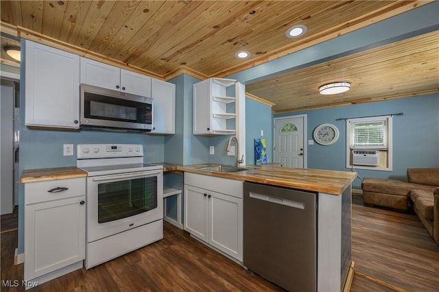188 Stratford Ave, Wadsworth, OH 44281 - kitchen featuring stainless steel appliances, wood ceiling, wood counters, open floor plan, and white cabinetry