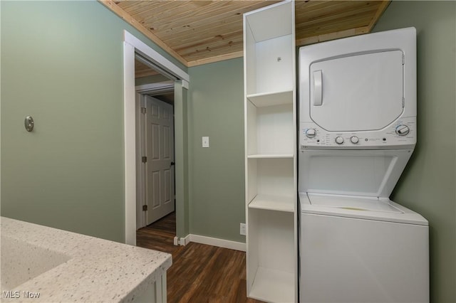 188 Stratford Ave, Wadsworth, OH 44281 - washroom with wood ceiling, stacked washer / dryer, and dark wood finished floors