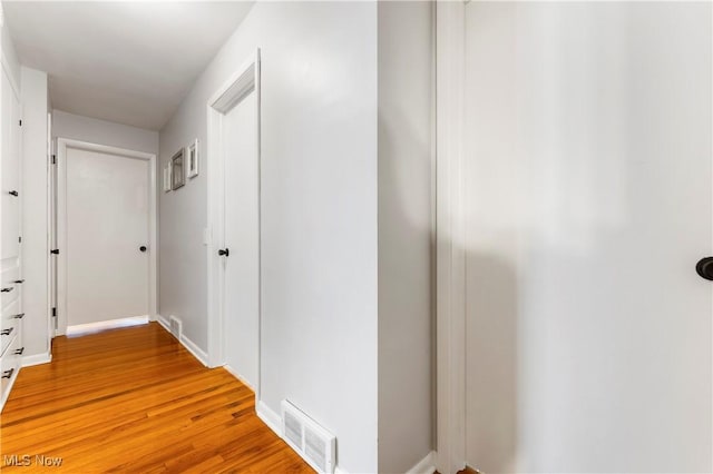 1103 Clinton Ave SE, North Canton, OH 44720 - hall with light wood-type flooring and baseboards