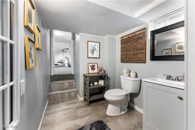 1103 Clinton Ave SE, North Canton, OH 44720 - half bath featuring vanity and baseboards