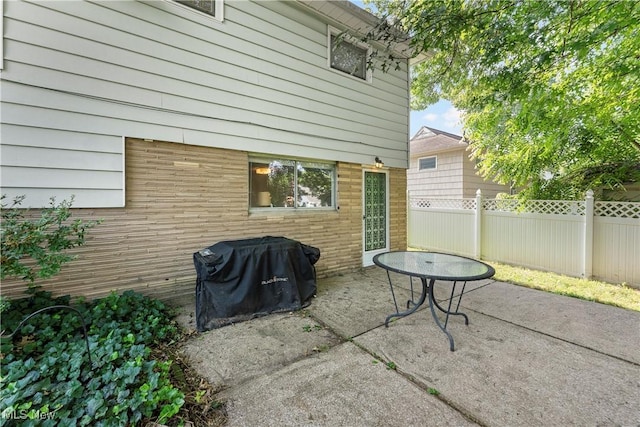 1103 Clinton Ave SE, North Canton, OH 44720 - view of patio / terrace featuring a grill