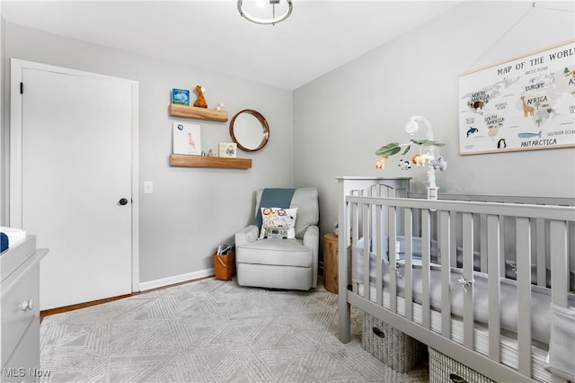 1103 Clinton Ave SE, North Canton, OH 44720 - bedroom featuring a crib and lofted ceiling