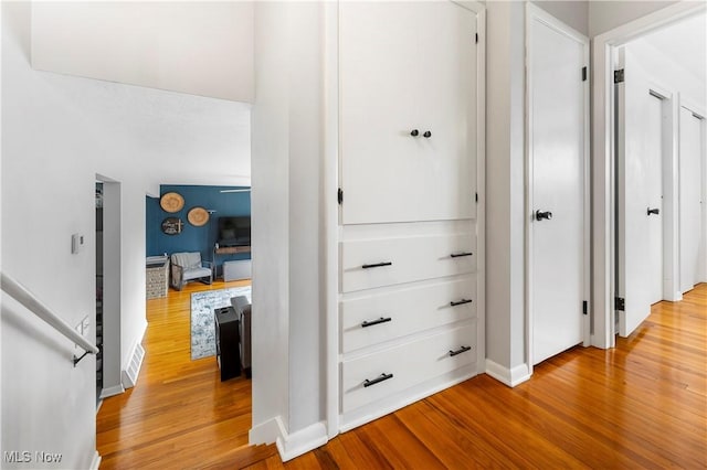 1103 Clinton Ave SE, North Canton, OH 44720 - hall with wood finished floors and baseboards