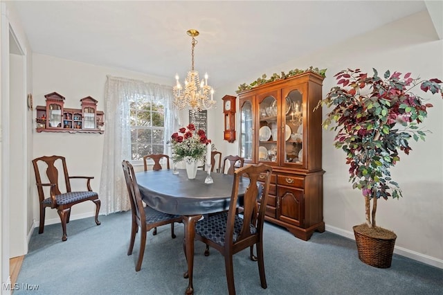 136 Westchester Dr, Brunswick, OH 44212 - carpeted dining room featuring a chandelier and baseboards