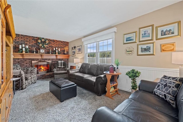 136 Westchester Dr, Brunswick, OH 44212 - carpeted living area with a wainscoted wall, a brick fireplace, and brick wall