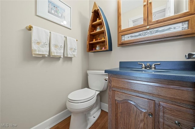 136 Westchester Dr, Brunswick, OH 44212 - half bathroom featuring vanity and wood finished floors