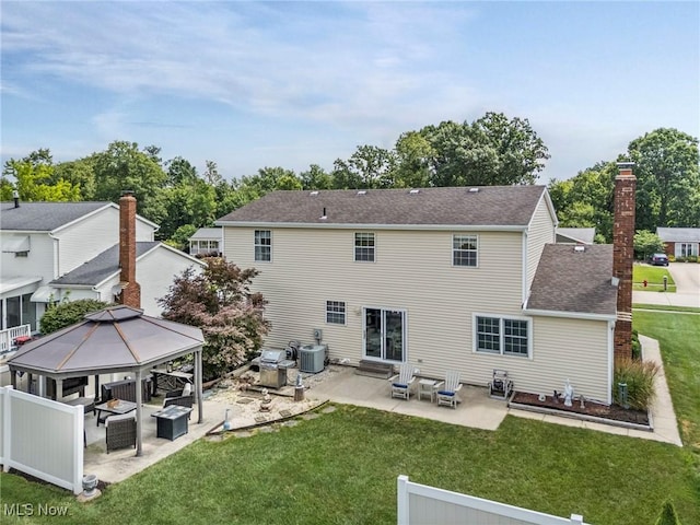 136 Westchester Dr, Brunswick, OH 44212 - back of house with a gazebo, a patio, a yard, and roof with shingles