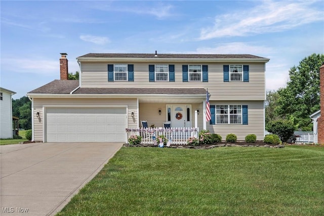 136 Westchester Dr, Brunswick, OH 44212 - view of front facade with a porch, driveway, a front yard, and a chimney